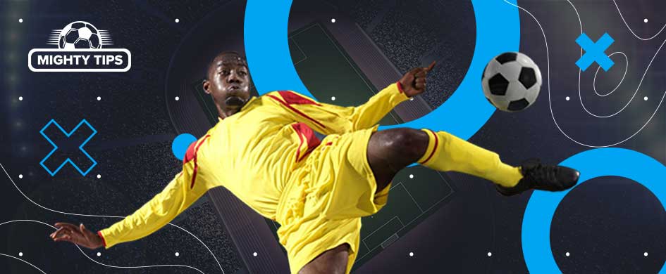 football player kicking the ball