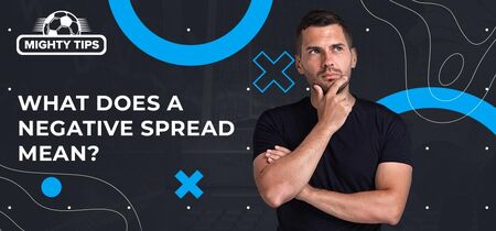 Image for 'What Does a Negative Spread Mean?' featuring a pensive man with his arms folded on his chest